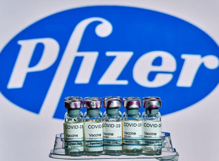 MALLORCA/ESPAA- November 13 2020: Pfizer Biontech research Coronavirus (Covid 19) vaccine. Row of vaccine bottles with blurred Pfizer company logo on