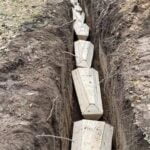 Ucrainenii uciși în Cernihiv sunt îngropaţi în tranşee, într-o pădure de la marginea orașului