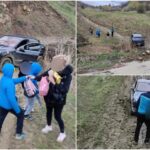Şofer de Porsche, rămas cu maşina blocată în noroi, pe un drum forestier din Buzău. Familia cu trei copii, salvată de jandarmi şi voluntari