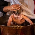 Cum erau botezați copiii pe vremea bunicilor noștri. Ce nume erau ”la modă” în acea perioadă